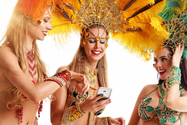 istock Brazilian women dancing samba over white background 1073130814