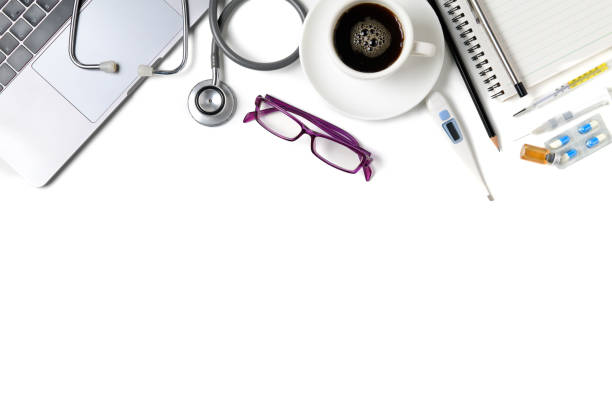 istock Top view of doctor desk table with stethoscope, 1073136990