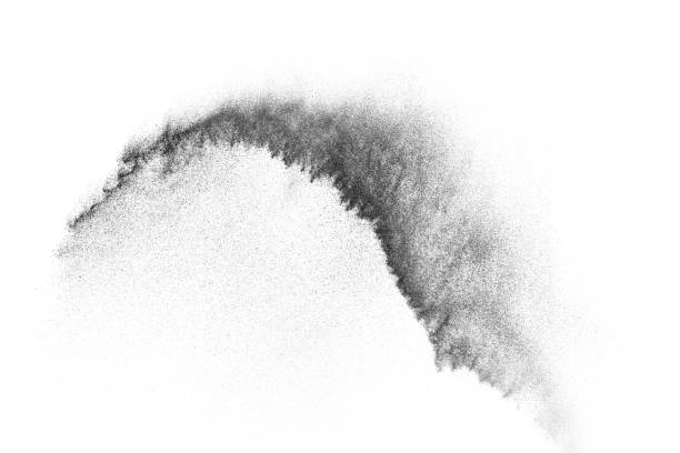 istock Freeze motion of black particles. 1073138864