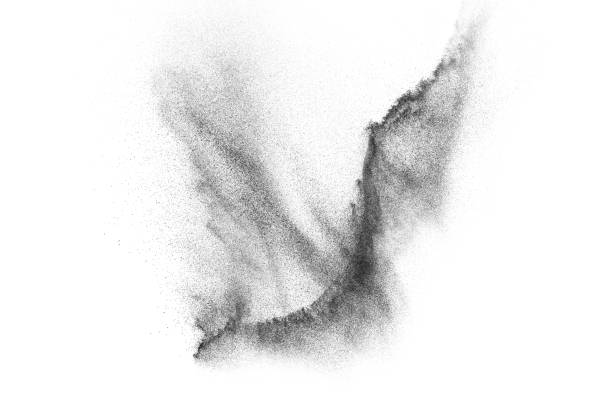 istock Freeze motion of black particles. 1073138900