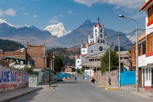 Typical street in the city of Huaraz, in the Andes Mountains of Peru. Huaraz is the capital of the Ancash Region and the elevation is 3000 meters above sea level. The city is a popular base to do hikes in the Andes Mountains.
