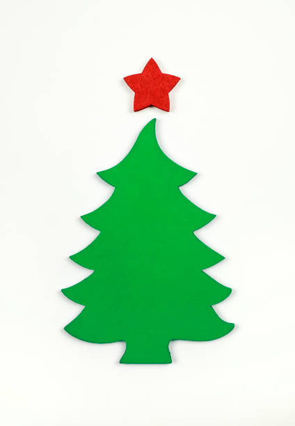 istock Little wooden christmas tree on the white background. Flat lay. Top view. 1073150116