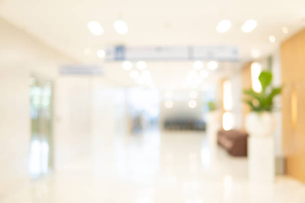 istock Abstract blur luxury hospital corridor. Blur clinic interior background with defocused effect. Healthcare and medical concept 1073154954