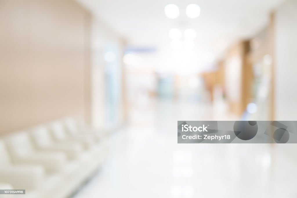 Abstract blur luxury hospital corridor. Blur clinic interior background with defocused effect. Healthcare and medical concept Hospital Ward Stock Photo