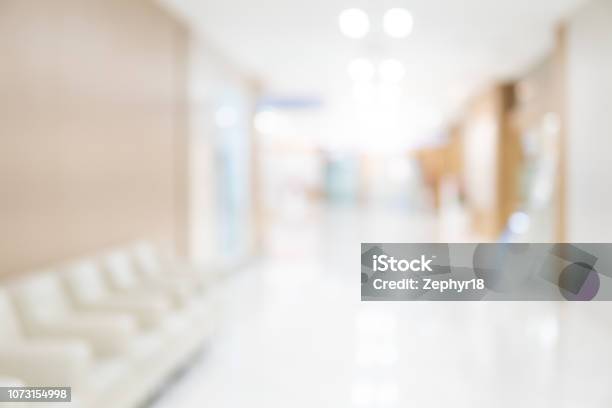 Abstract Blur Luxury Hospital Corridor Blur Clinic Interior Background With Defocused Effect Healthcare And Medical Concept Stock Photo - Download Image Now
