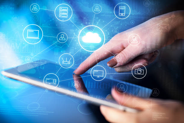 istock Hand working in tablet graphs and charts and reports concept around 1073156624