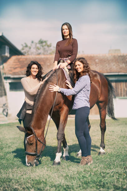 istock Tree beautiful woman with horse 1073168106