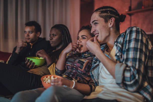 istock People watching a movie at home 1073169734