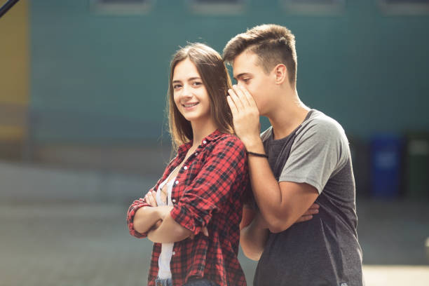istock Two teenagers talking outdoors 1073171106