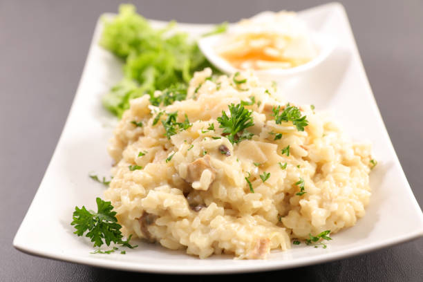 istock risotto with mushroom and parmesan 1073173864