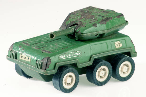 istock toy war tank isolated on white background 1073182750