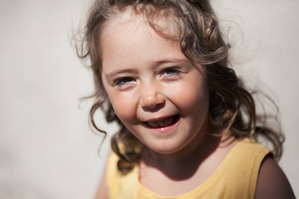 istock Little girl 4 years on the beach 1073186336