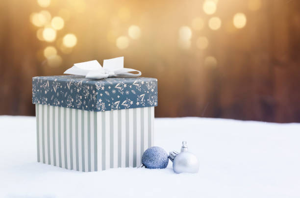 istock gift box in snow - christmas lights 1073192908