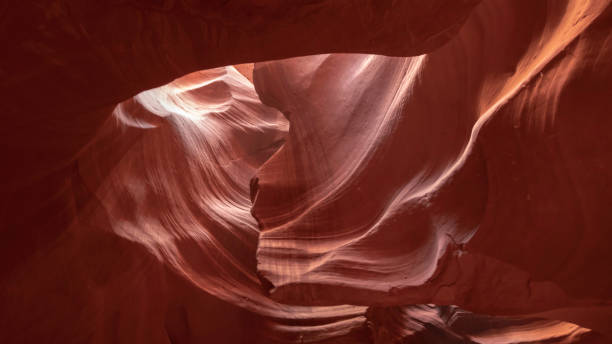istock Curve waveform orange yellow sandstone in Upper Antelope reflecting sunlight, Arizona 1073195400