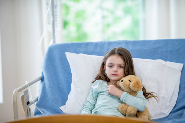 istock Sad hospital girl 1073199730