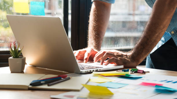 istock Heavy work for architects Or engineers are working on projects at their own desks with graphics, laptops, phones and notebooks. 1073205048