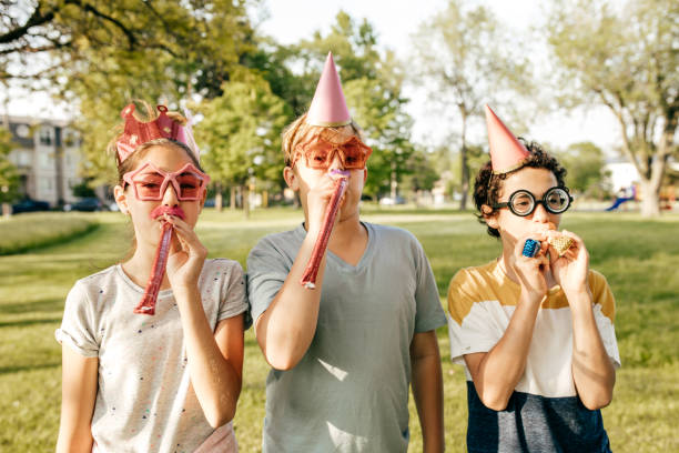 istock Kids having fun on birthday party 1073206472