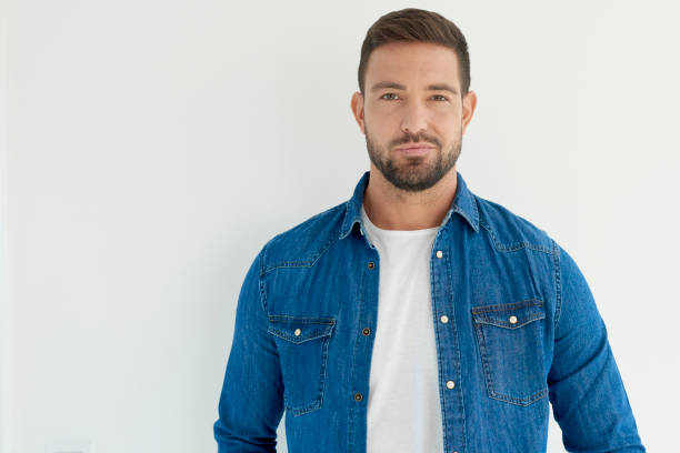 istock Handsome young man standing at isolated background 1073211266