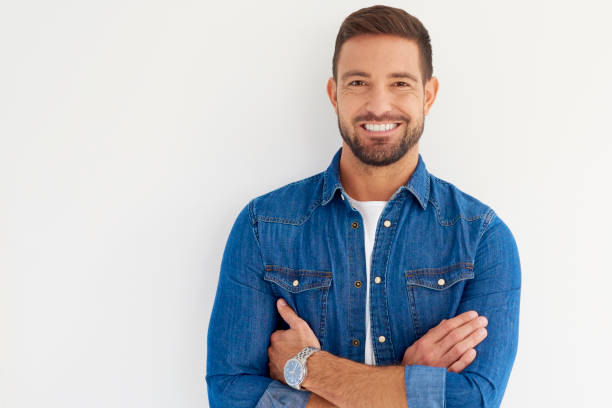 istock Handsome young man studio portrait at isolated white background 1073211268