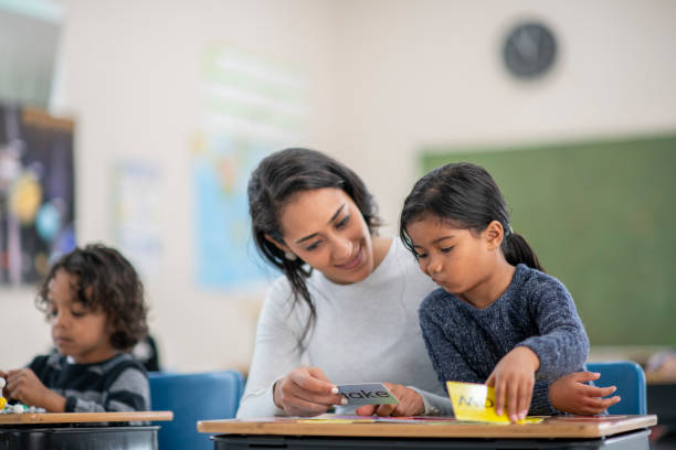 istock Thinking girl at desk 1073211522