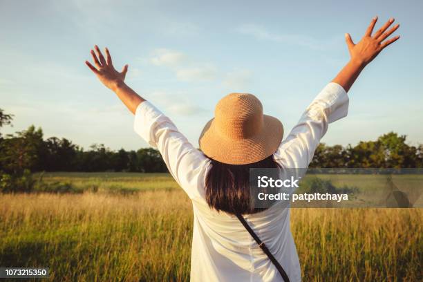 Woman Feel Free In The Field Stock Photo - Download Image Now - Adult, Adults Only, Agricultural Field