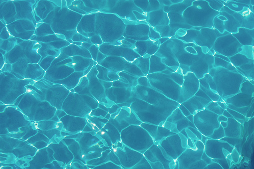 Fondo superficial de agua de piscina photo