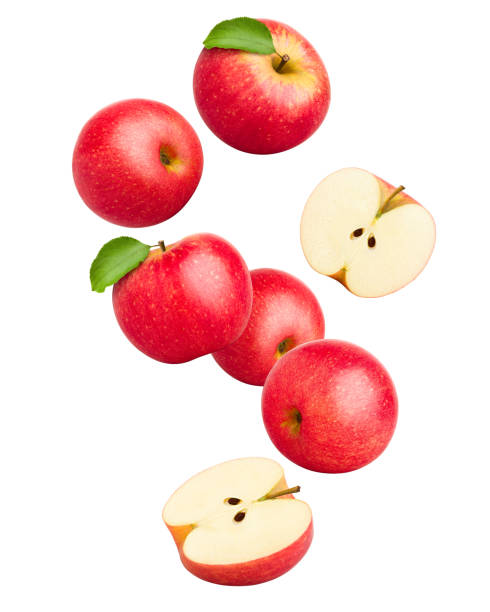 Falling Red juicy apple isolated on white background, clipping path, full depth of field