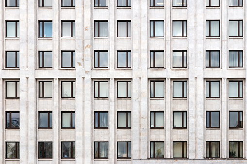 Windows background (facade of a gray building)