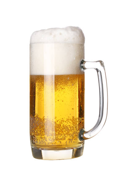 istock Close up one frothy beer glass isolated on white 1073220404