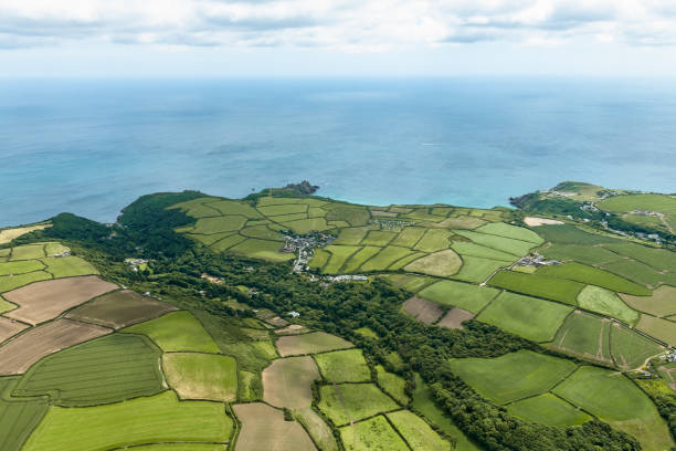 Aerial views over the Cornish Coastline at Lamorna Cove Aerial views over the Cornish Coastline at Lamorna Cove lamorna cove stock pictures, royalty-free photos & images
