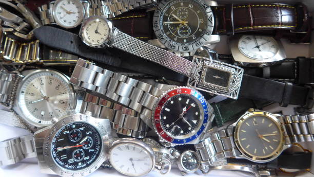 Old used wristwatches at the flea market for sale
