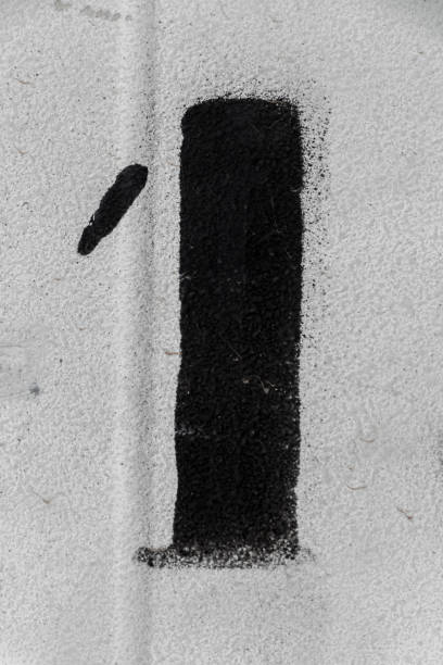 istock number 1 black spray paint on white background 1073236892