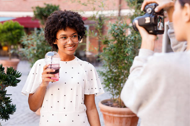 istock Photographer taking product photos for a client, working with a model 1073237280