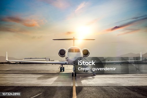 istock Private Jet On Airport Runway 1073242890
