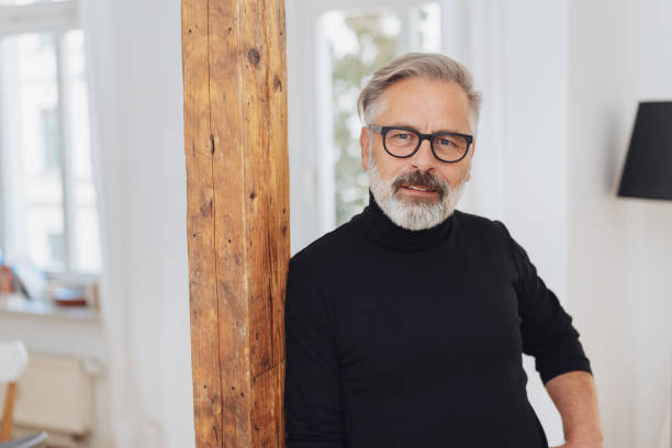 istock Man staring intently at the camera with a frown 1073249590