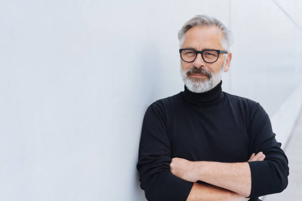 istock Middle-aged bearded man wearing polo neck jumper 1073250168