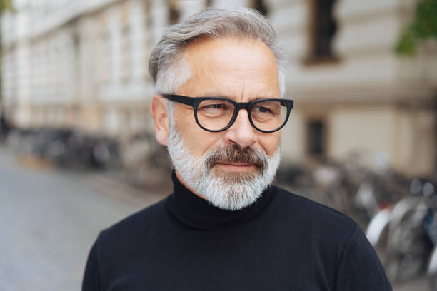 istock Middle-aged bearded man with glasses 1073250480