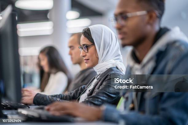 Students Using Technology Stock Photo - Download Image Now - 20-24 Years, 25-29 Years, Adult