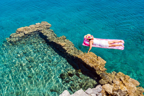 istock Woman is lying on the sea bed. 1073254804