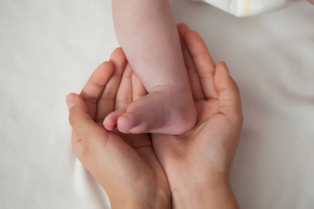 istock newborn baby feet 1073260252