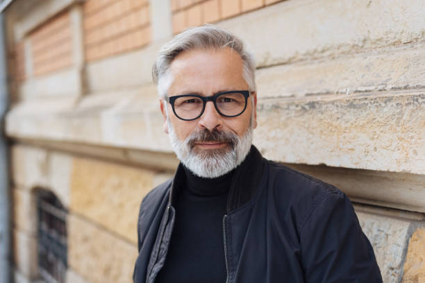 istock Serious attractive bearded man wearing glasses 1073260290