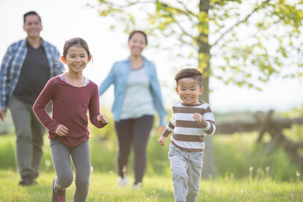 istock Family In A Field 1073267878