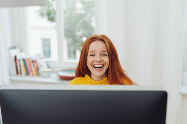istock Vivacious young woman enjoying a good laugh 1073272498