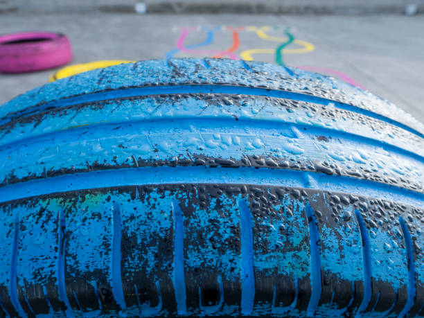 istock Colorful tires in a playground, close-up 1073272656