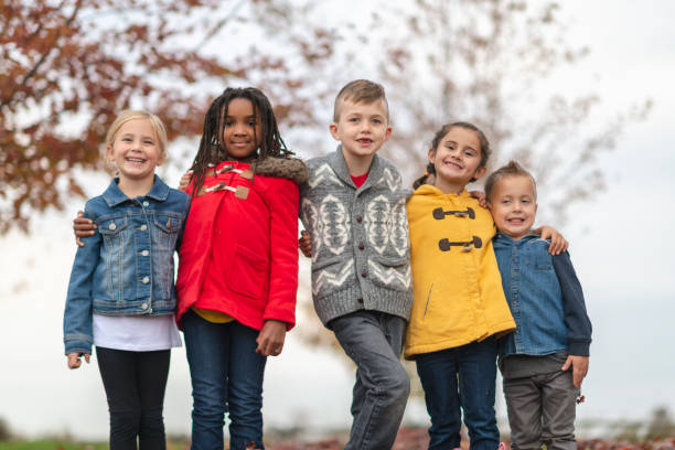 istock Children in the park in fall 1073274184
