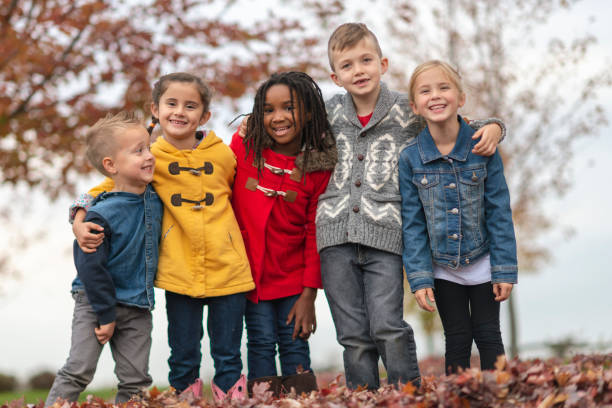 istock Children in the park in fall 1073274198