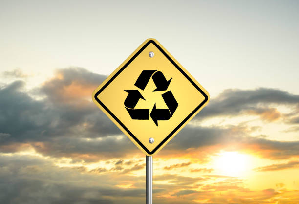 road sign recycle sign on the sunset sky. 3D illustration