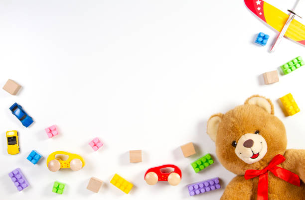 istock Colorful kids toys frame on white background. Top view. Flat lay. 1073281444