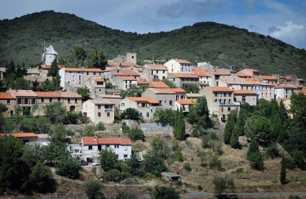 istock pyrenees mountain village and windmill 1073285630