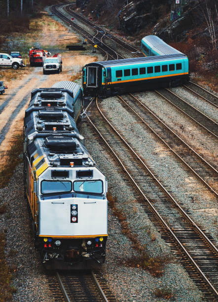 Minor passenger train derailment in a large rail yard.